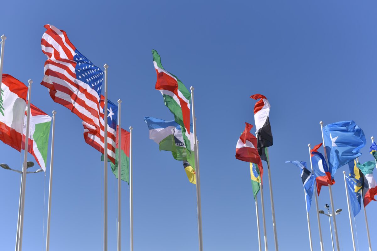 Flags of various countries including U.S., Lebanon among others.